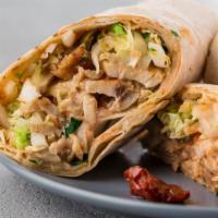 Turkey Burger Wrap · Fresh and juicy crispy homemade falafel, lettuce, tomatoes, feta cheese, cucumbers and low f...