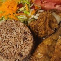 Fried Chicken · Served with choice of rice and peas, white rice, steam vegetables, or raw salad.