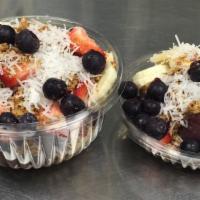 Acai Bowl · Acai with Granola, Banana, Blueberries and
Strawberries Topped with Coconut and a Drizzle of...