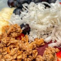 Acai Bowl · With granola, banana, blueberries, strawberries, coconut, and honey.