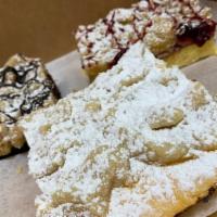 Crumb Cake · Deliciously Fresh Made Crumb Cakes Your Choice of Chocolate, Raspberry and Original