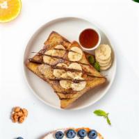 Choco Loco Banana Pancake · Fresh bread battered in egg, milk, and cinnamon cooked until spongy and golden brown. Topped...