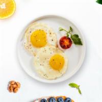 Fried Egg · Get a pair of lightly fried eggs!