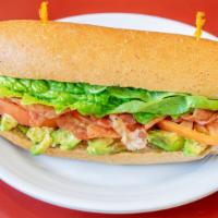 Avocado B.L.T Sandwich · Bacon, avocado, romaine lettuce, tomato, and chipotle mayonnaise. Includes kettle chips.