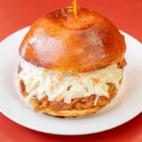 Pulled Pork Sandwich · Pulled pork, Swiss cheese, and coleslaw. Includes kettle chips.