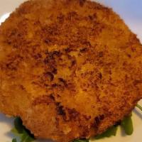 Maryland Crab Cakes · two fresh Maryland lump crab cakes coated with our seasoned crumbs and fried, served with ch...