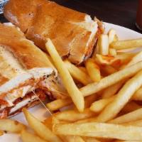 Chicken Parnesan Hero · breaded chicken cutlet with melted mozzarella cheese and house-made marinara sauce on toaste...