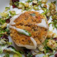 Brussels Sprout Salad · Roasted Brussels Sprouts, Dried Cranberries served with a Risotto and Quinoa Cake drizzled w...