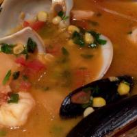 Chupe · South American chowder with clams, shrimp, mussel, yucca.