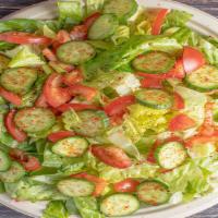 Garden Salad · Mixed greens, tomatoes, cucumbers, carrots, broccoli and peppers.