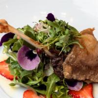 Duck Confit Salad · Crispy duck confit, mixed greens, berries, goat cheese, onions, miso vinaigrette