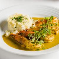 Curry Shrimp · Jumbo shrimp, basmati rice, curry, saffron, and anise.