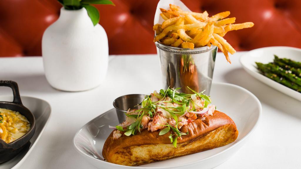 Lobster Roll* · Maine lobster, celery, and brandy cream sauce.