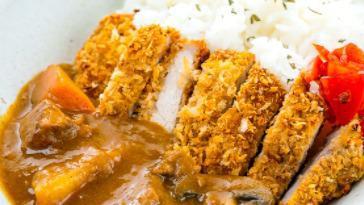 Chicken Katsu Curry Rice · Home-made Chicken based Curry Rice topped with Chicken Katsu Panko Fried Cutlet. Side of fukujin-zuke pickles