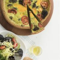 Quiche Aux Légumes · Spinach, broccoli, leeks, cheddar, and roasted tomatoes.