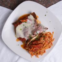 Chicken Parmigiana · Includes your choice of spaghetti, penne, linguini, tossed salad or french fries.  Bread ser...