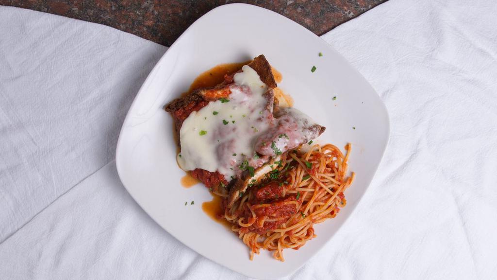 Chicken Parmigiana · Includes your choice of spaghetti, penne, linguini, tossed salad or french fries.  Bread served with all dinners.