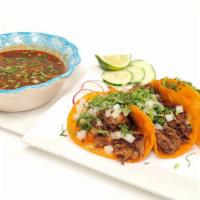 Birria Tacos · Traditional beef brisket birria tacos served with cheese,onions,cilantro and side consome. 3...