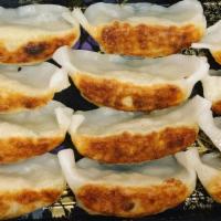 Chicken Gyoza · 6 pieces. Pan fried dumplings.