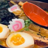 Original Tonkotsu Ramen Bowl · 10-12 hour pork broth, raised pork belly, soft boiled egg, scallions, wood ear mushrooms, ba...