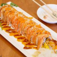 Golden Hawaii Roll · Shrimp tempura, mango, topped with crab stick, masago, spicy mayo, eel sauce & tempura crunch.