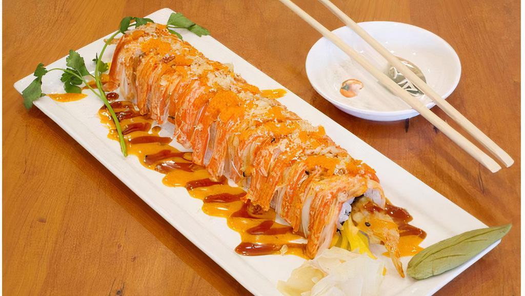 Golden Hawaii Roll · Shrimp tempura, mango, topped with crab stick, masago, spicy mayo, eel sauce & tempura crunch.