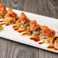 Volcano Roll · Salmon inside and spicy tuna on top. Deep fried. With spicy mayo and eel sauce.