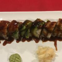 Eel Dragon Roll · Shrimp tempura, mango, topped with eel & eel sauce.