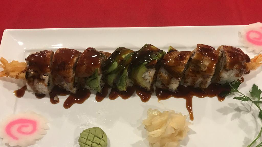 Eel Dragon Roll · Shrimp tempura, mango, topped with eel & eel sauce.
