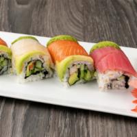 Rainbow Roll · Crab stick, avocado, cucumber topped with fresh salmon & tuna.