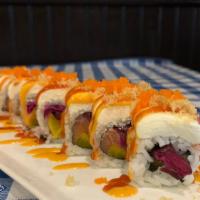 Philadelphia Roll · Smoked salmon, red pickled cucumber, oshinko, topped with masago, cream cheese, spicy mayo &...