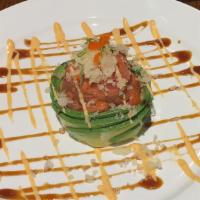 Tuna, Yellowtail Or Salmon Tartar. · Marinated with spicy sauce, soy sauce and sesame oil topped with caviar.