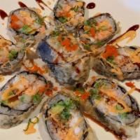 Fried Volcano Roll · Tuna, salmon, white fish, crab, tobiko and avocado, fried with spicy sauce.