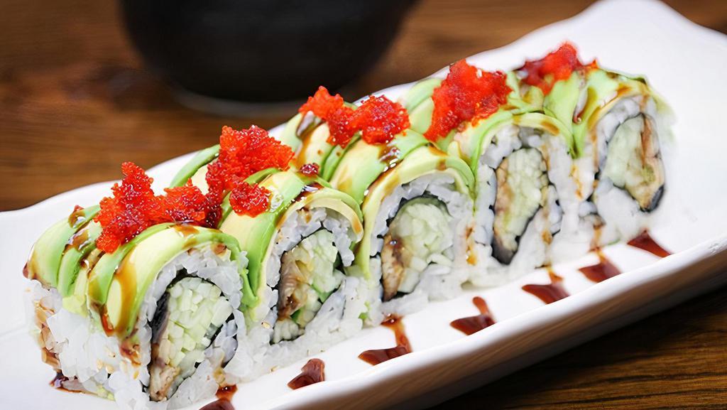 Dragon Roll · Eel cucumber with avocado and tobiko outside.