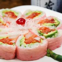 Spicy Girl Roll · 10 pieces. Spicy salmon, tuna, yellowtail, avocado, tobiko, kani, crunch inside white seawee...