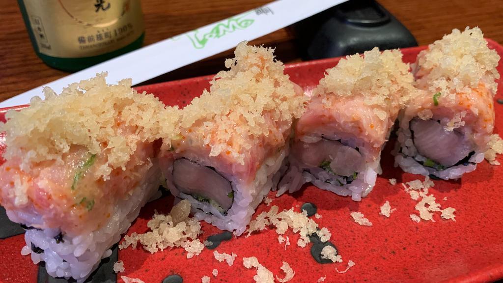 Yellow River Roll · Yellowtail and scallion roll topped with spicy yellowtail and tempura flake.