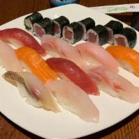 Sushi Deluxe · Tuna roll and 10 pieces of sushi.