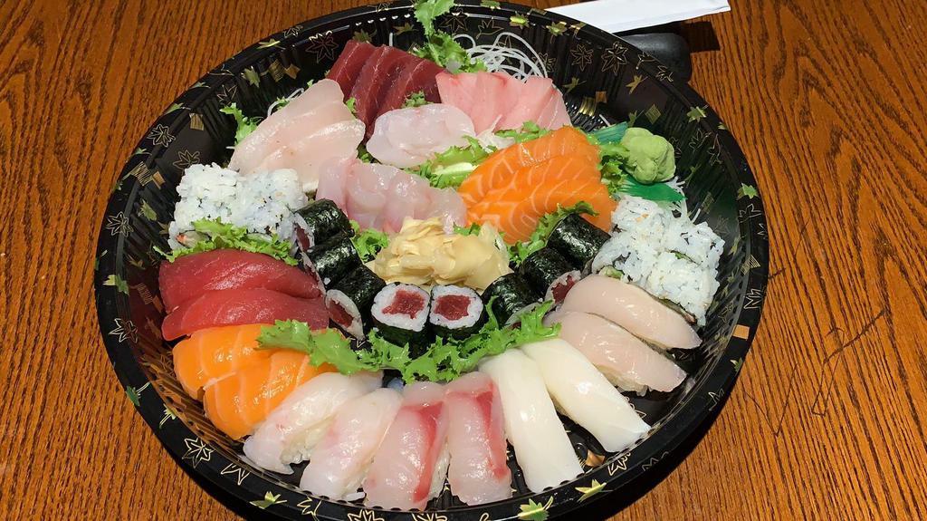 Sushi And Sashimi Combo For 2 · 12 pieces sushi, 18 pieces sashimi, 1 tuna roll and 1 california roll.