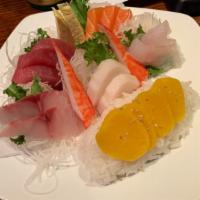 Chirashi · Assorted sashimi with sushi rice on side.