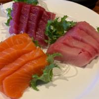 Tricolor Sashimi · 4 tuna, 4 salmon and 4 yellowtail.