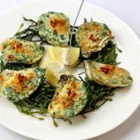 Oysters Rockefeller · ½ dozen, spinach, parmesan, and pernod.