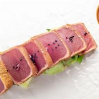 #1 Yellowfin Tuna · Steamed bok choy, mustard greens, and sesame-soy vinaigrette.
(DF)