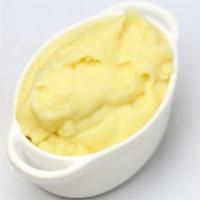 Truffle Mashed Potatoes · Roasted garlic and parmesan cheese.
(GF)