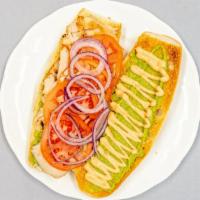Turkey Avocado · Grilled turkey, avocado, tomatoes, red onions, and chipotle sauce on a sub wrap roll.