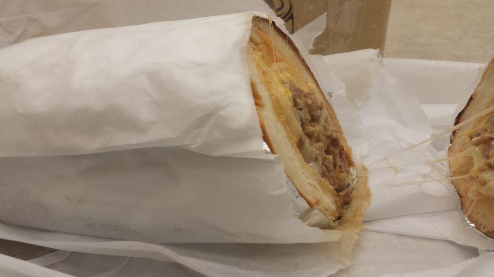 Double Trouble · Steak, turkey, American cheese, swiss, onions, and Russian dressing on a sub wrap roll.