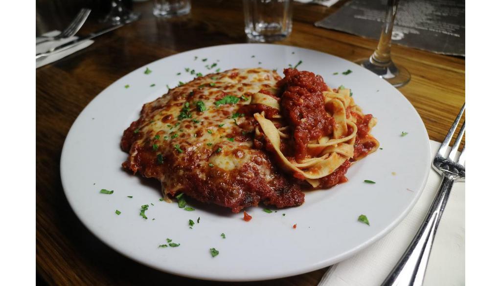 Chicken Parmigiana · Breaded with panko and topped with fior di latte,  served with penne