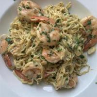 Shrimp Scampi · Homemade spaghetti tossed with jumbo shrimp in a scampi sauce