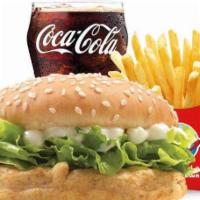 Grilled Chicken Sandwich Combo · Papas fritas and soda.