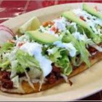 Steak Huarache / Huarache De Bistec · Beef.
SERVED WITH FRIED BEANS MOZZARELLA CHEESE, MEAT OF YOUR CHOICE, LETTUCE, CREAM, CHEESE...