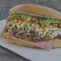 Breaded Chicken Mexican Sandwich / Torta De Milanesa De Pollo · Breaded chicken.
TOASTED BREAD STUFFED WITH FRIED BEANS, MOZZARELLA CHEESE, MEAT OF YOUR CHO...
